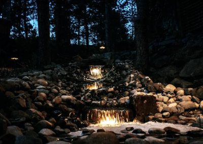 Kalagan Outdoor Design custom designed waterfall at dusk